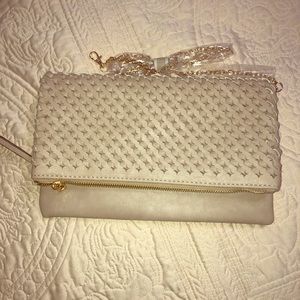 Neela woven flat clutch